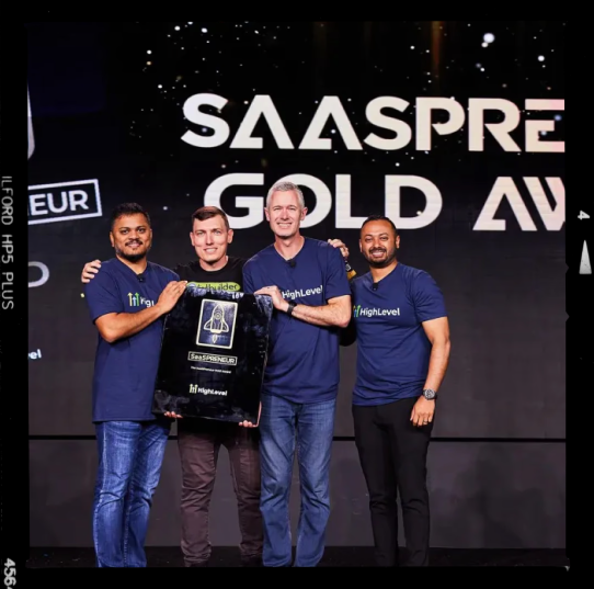 Jeff receiving the SaaSpreneur Gold Award from HighLevel